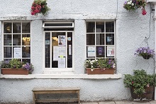 Beautiful windows of a restaurant in a small town in Scotland