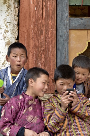 These kids are in a different world at the village festival in Ura valley