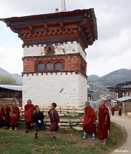 Kids playing as younger monks watch at Gangtey, Phobjikha Valley, Bhutan