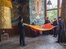Flag being taken down at Punakha dzong