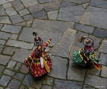 View from above - Dancers at the monastery festival in Bhutan