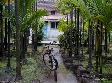 Bicycle and the house in Kokan